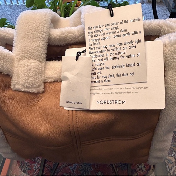 Stand Studio Medium Lolita
Faux Shearling & Faux Leather Tote - Picture 13 of 14